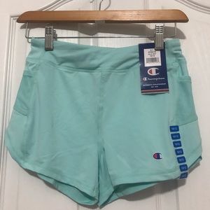 NWT Champion shorts with mesh pockets on side. Size 4